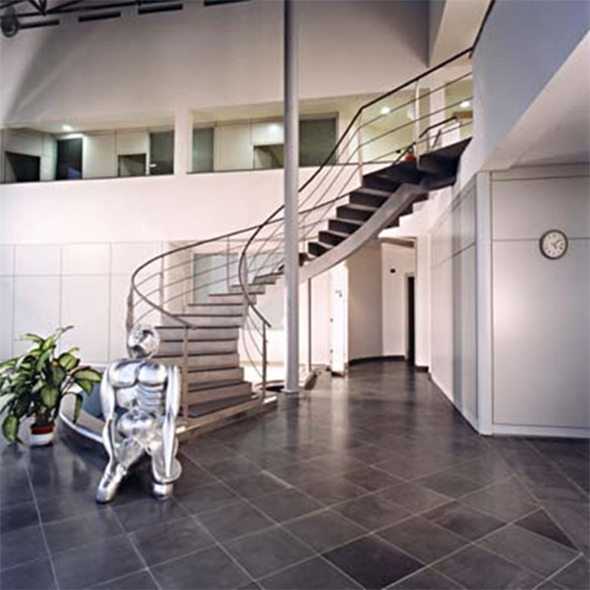 curved staircase with tempered glass top handrail