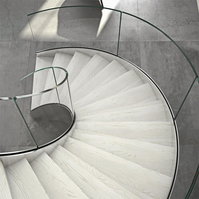 Contemporary style cast iron marble treads curved staircase 