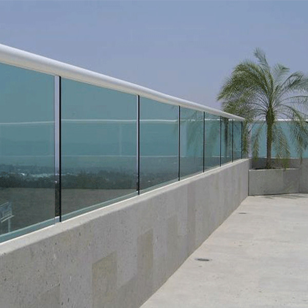 floor mounted glass railing with u channel handrail