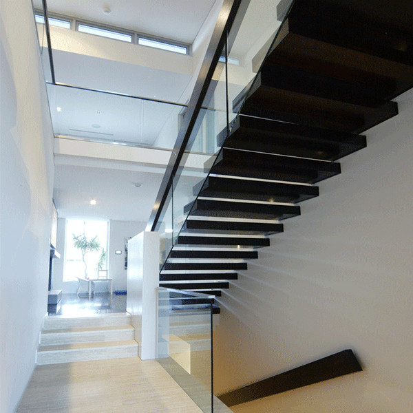 side mounted glass railing with steel handrail
